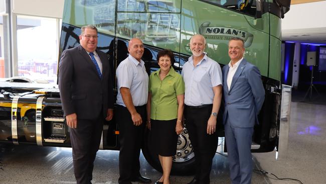 Scott Buchholz MP (left) with members of the Nolan family as they take ownership of Volvo's 50,000th vehicle manufactured at Wacol.