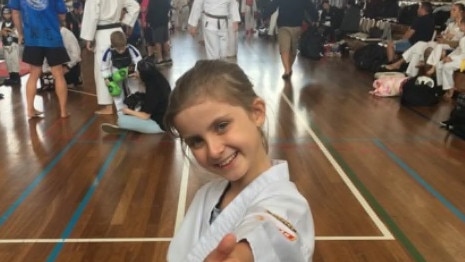 Caeli McGowan, a first dan black belt, is a “devoted and determined young lady”.