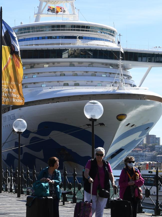 Cruise ship passengers disembark from the Ruby Princess at Circular Quay in Sydney on Thursday. Picture: AAP