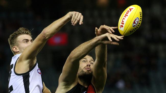 Dougal Howard of the Power goes up against Tom Bellchambers on Sunday. Picture: AAP Image/Hamish Blair