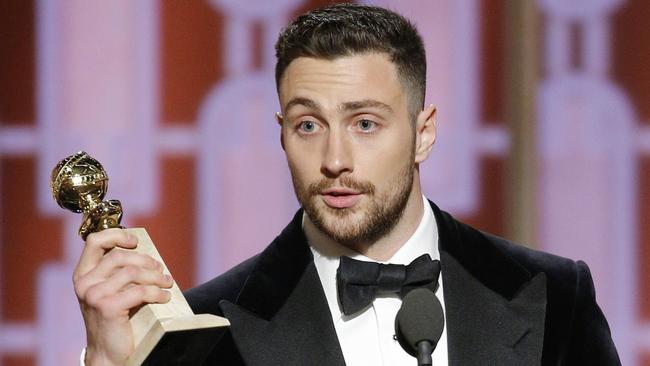 Aaron Taylor-Johnson accepts the award for best supporting actor.