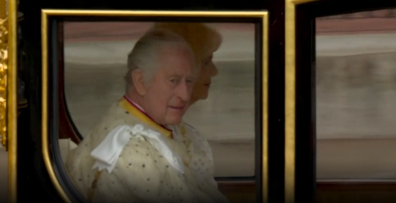 King Charles and the Queen Consort are sitting side-by-side in the coach. Picture: Sky News