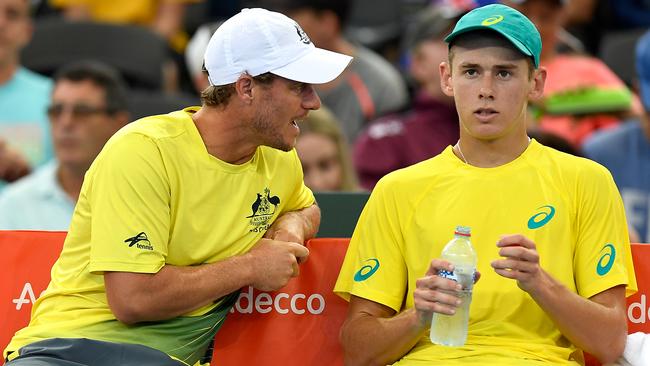 Lleyton Hewitt, left, with Alex de Minaur. Picture: Getty Images.