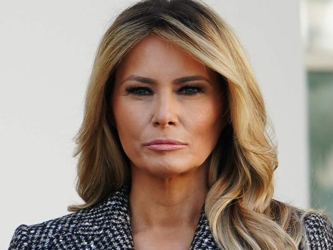 First Lady Melania Trump watches as US President Donald Trump speaks during the annual Thanksgiving turkey pardon in the Rose Garden of the White House in Washington, DC on November 24, 2020. (Photo by MANDEL NGAN / AFP)