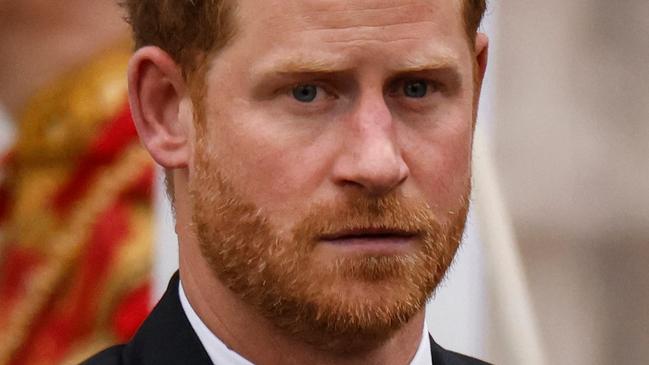 Britain's Prince Harry, Duke of Sussex leaves Westminster Abbey after the Coronation Ceremonies of Britain's King Charles III and Britain's Queen Camilla in central London on May 6, 2023. - The set-piece coronation is the first in Britain in 70 years, and only the second in history to be televised. Charles will be the 40th reigning monarch to be crowned at the central London church since King William I in 1066. Outside the UK, he is also king of 14 other Commonwealth countries, including Australia, Canada and New Zealand. (Photo by Odd ANDERSEN / AFP)