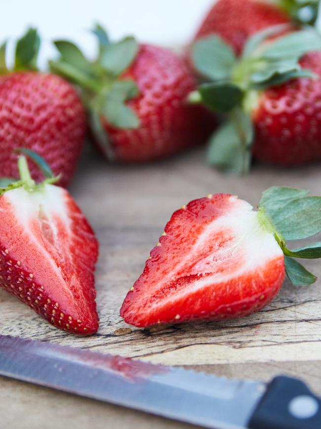 Mrs Wicks urged Coasties to continue buying strawberries, and cut them up. Picture: Erik Anderson