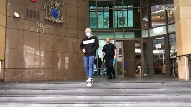 Accused slaver Chee Kit Chong dances outside court