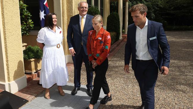 Grace Tame avoids eye contact as the awkward foursome splits up. Picture: NCA NewsWire / Gary Ramage Picture: NCA NewsWire / Gary Ramage