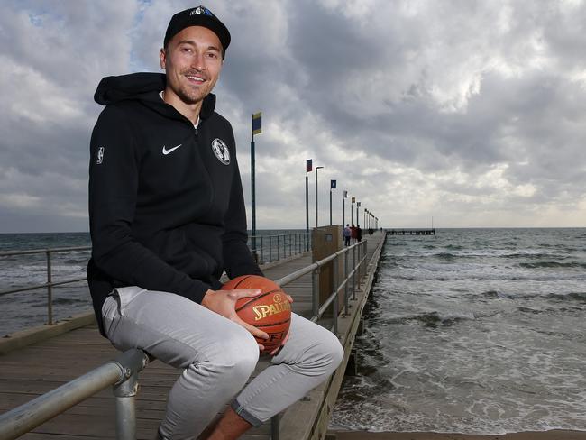 Australian basketballer Ryan Broekhoff who has just signed with the Dallas Mavericks in the NBA on Frankston beach where he spend a lot of time whilst growing up  . Pic: Michael Klein