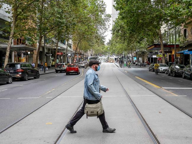 The compulsory need to wear masks inside workplaces is a major deterrent for many workers. Picture: NCA NewsWire / Ian Currie