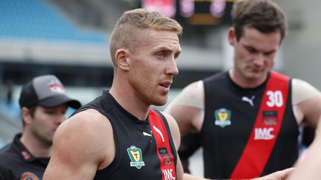 North Launceston player/coach Bradley Cox-Goodyer addresses his players at three-quarter time of last week’s match against Clarence. Picture: Zak Simmonds