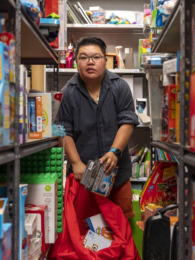 Child life therapist Gy Ho fills the Santa sacks at Bear Cottage. Picture: Monique Harmer