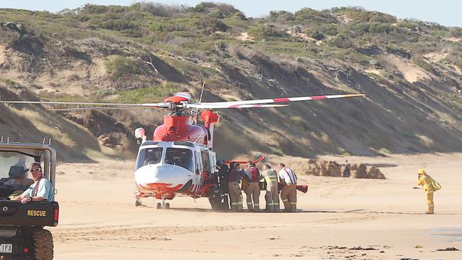 A casualty is carried to the air ambulance. Picture: Alan Barber