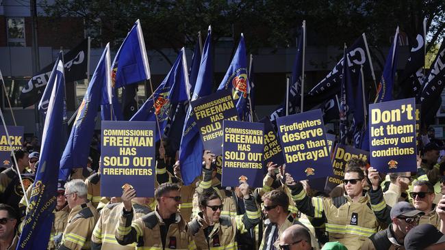 Firefighters have taken to the streets in protest against ongoing disputes over pay and workplace conditions. Picture: Valeriu Campan