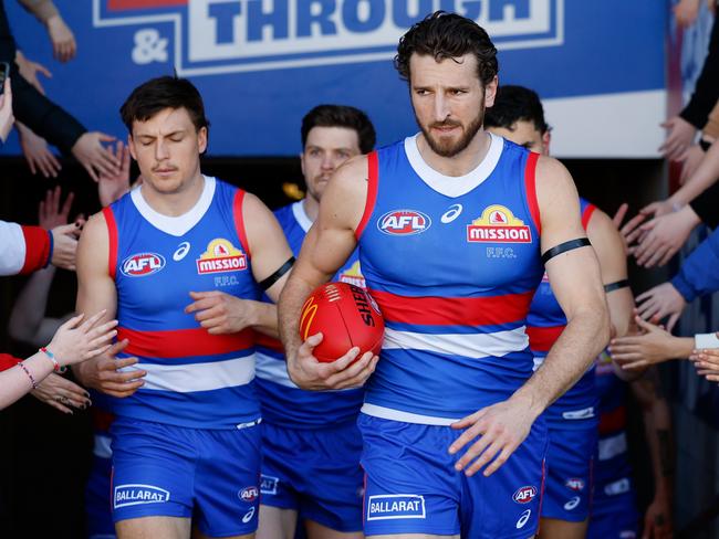 BALLARAT, AUSTRALIA - AUGUST 25: Marcus Bontempelli of the Bulldogs leads his team on to the field during the 2024 AFL Round 24 match between the Western Bulldogs and the GWS GIANTS at Mars Stadium on August 25, 2024 in Ballarat, Australia. (Photo by Dylan Burns/AFL Photos via Getty Images)