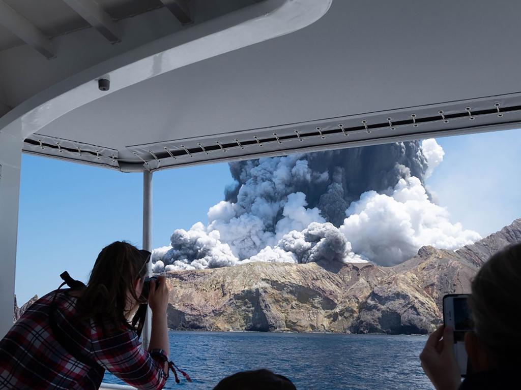 Tourists were evacuated on a boat from the island. Of those that stayed overnight, no one is believed to have survived. Picture: Michael Schade / AFP.