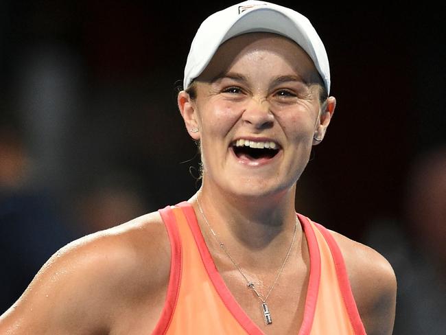 Australia's Ashleigh Barty reacts after her women's singles match against Romania's Simona Halep at the 'A Day at the Drive' exhibition tennis tournament in Adelaide on January 29, 2021. (Photo by Michael Errey / AFP) / -- IMAGE RESTRICTED TO EDITORIAL USE - STRICTLY NO COMMERCIAL USE --