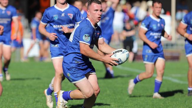 Hamish Holland runs to space. Picture: Steve Montgomery Sports Photography