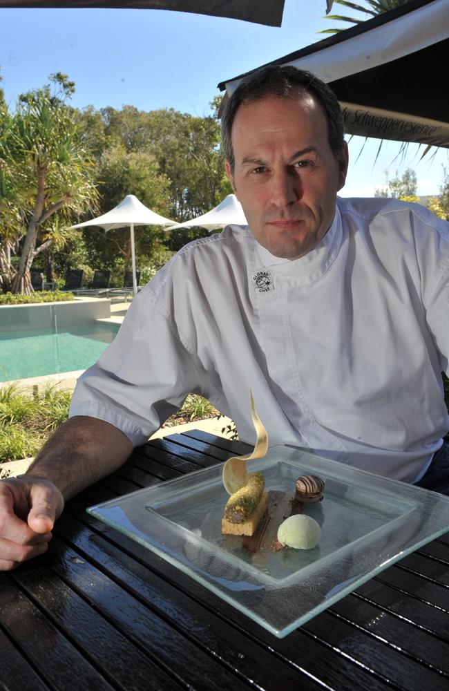 Executive chef of RACV Restaurant Lee Jeynes with one of creations. Picture: John McCutcheon