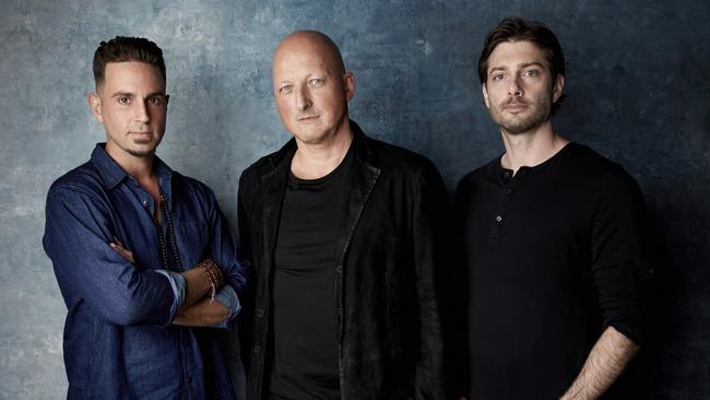 Wade Robson (left), director Dan Reed (centre) and James Safechuck, who made the shocking documentary Leaving Neverland. Picture: Taylor Jewell/Invision/AP