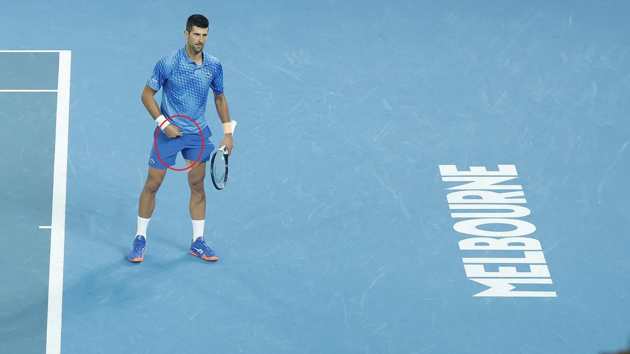 MELBOURNE, AUSTRALIA - JANUARY 29: Novak Djokovic of Serbia celebrates winning championship point in the Menâ&#128;&#153;s Singles Final against Stefanos Tsitsipas of Greece during day 14 of the 2023 Australian Open at Melbourne Park on January 29, 2023 in Melbourne, Australia. (Photo by Darrian Traynor/Getty Images)