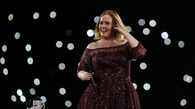 Adele encourages fans to light up their phones during the concert in Brisbane last weekend. Picture: Glenn Hunt/Getty.