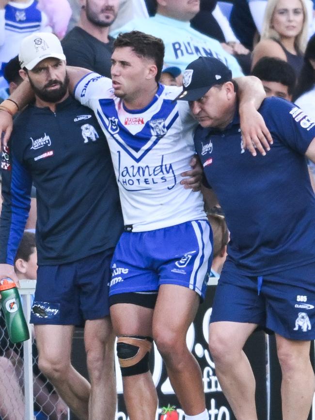 Jake Averillo limps off the field. Picture: NRL