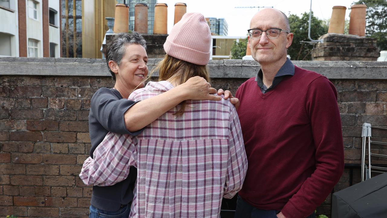 27/9/24: Parents Anthony and Bernie with their daughter (not to be identified) who suffers from  schizophrenia. John Feder/The Australian.