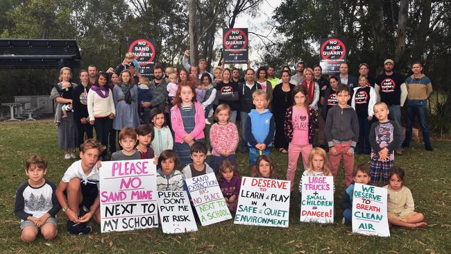 Montessori parents gather to protest the proposed sand mine for Forest Glen.