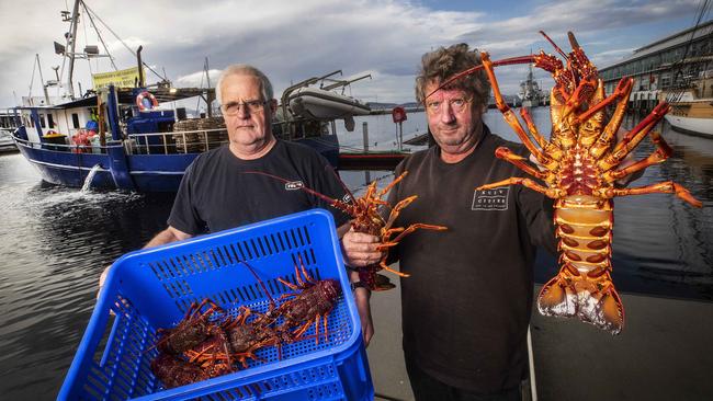 Marie 1 deckhands Dale Cronley and Glen Bradshaw selling crays at Hobart. Picture: Chris Kidd