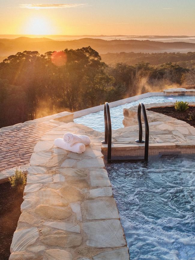 The artesian spring-fed hot pools also come with an amazing vista.