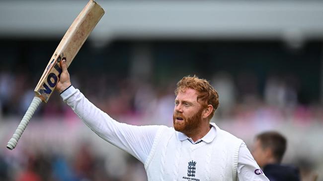 England's Jonny Bairstow raises his bat to the crowd as he leaves the field unbeaten on 99. Picture: AFP