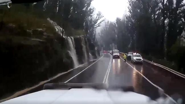 Footage from the flooded roadway before it was closed. Picture: @_MollieGorman