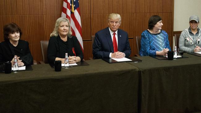 From the right: Paula Jones, Kathy Shelton, Donald Trump, Juanita Broaddrick and Kathleen Willey. (AP Photo/ Evan Vucci)