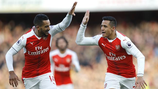 Arsenal's Alexis Sanchez, right, and Arsenal's Theo Walcott celebrate.