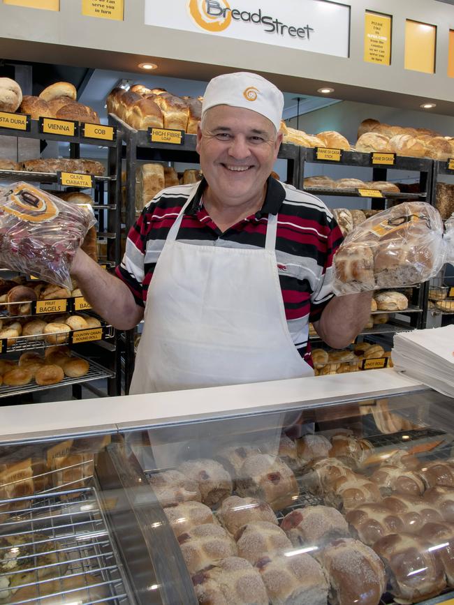 Owner David Winter is creating all kinds of new hot cross bun flavours. Picture: Andy Brownbill