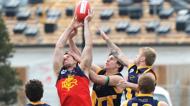 RDFL Football: Diggers Rest V Rupertswood. Rupertswoods Jordan Braddy and David Morrice cant stop Diggers Rest