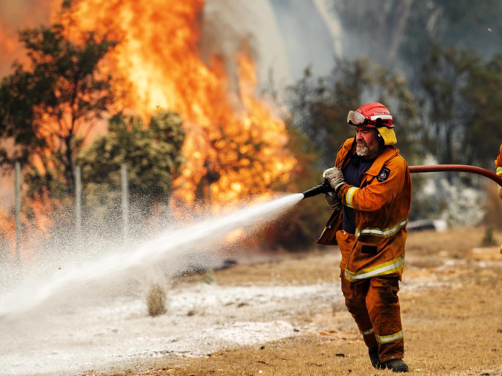 St Marys TFS Volunteers during back burning operations at Fingal. PICTURE CHRIS KIDD