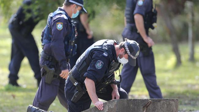 Police conduct a line search at the scene of the fatal shooting of a 45 year old man at Salt Ash. Picture: NCA NewsWire / Peter Lorimer.