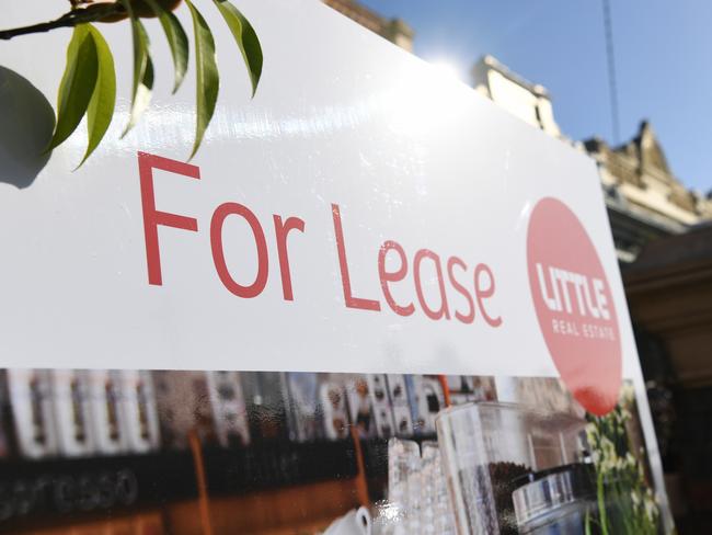 Signage for a real estate property is seen in Carlton North, Melbourne, Wednesday, July 18, 2018. (AAP Image/James Ross) NO ARCHIVING