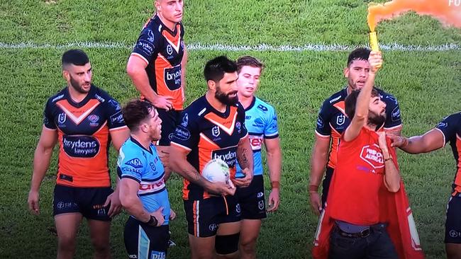 A pitch invader made onto the field in the Tigers v Sharks game. Fox League