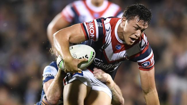 Joseph Manu played on the wing for the Roosters on Thursday night. Picture: Albert Perez/Getty Images