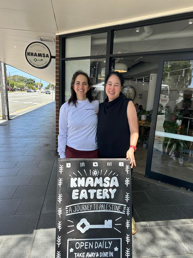 Khamsa Eatery in Newtown, Sydney has announced it will close its doors on Sunday. Owner Sara Shaweesh (left, pictured with Newtown Greens MP Jenny Leong) took to Instagram to explain the closure. Picture: Supplied / Instagram