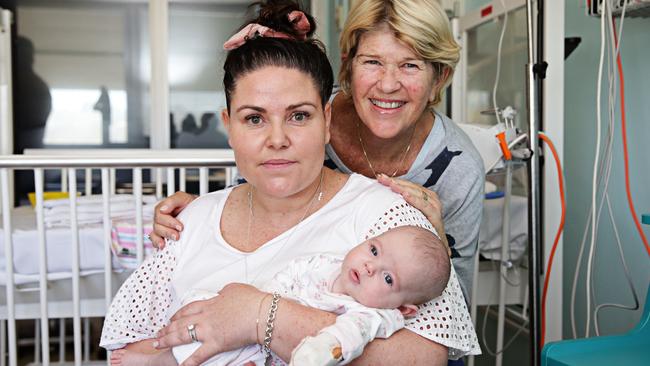 First patients to be transferred from Mona Vale Hospital to NBH, Amanda Liddell (grandma), Tasman Smith and her new born baby Florence Smith. Picture: Adam Yip.