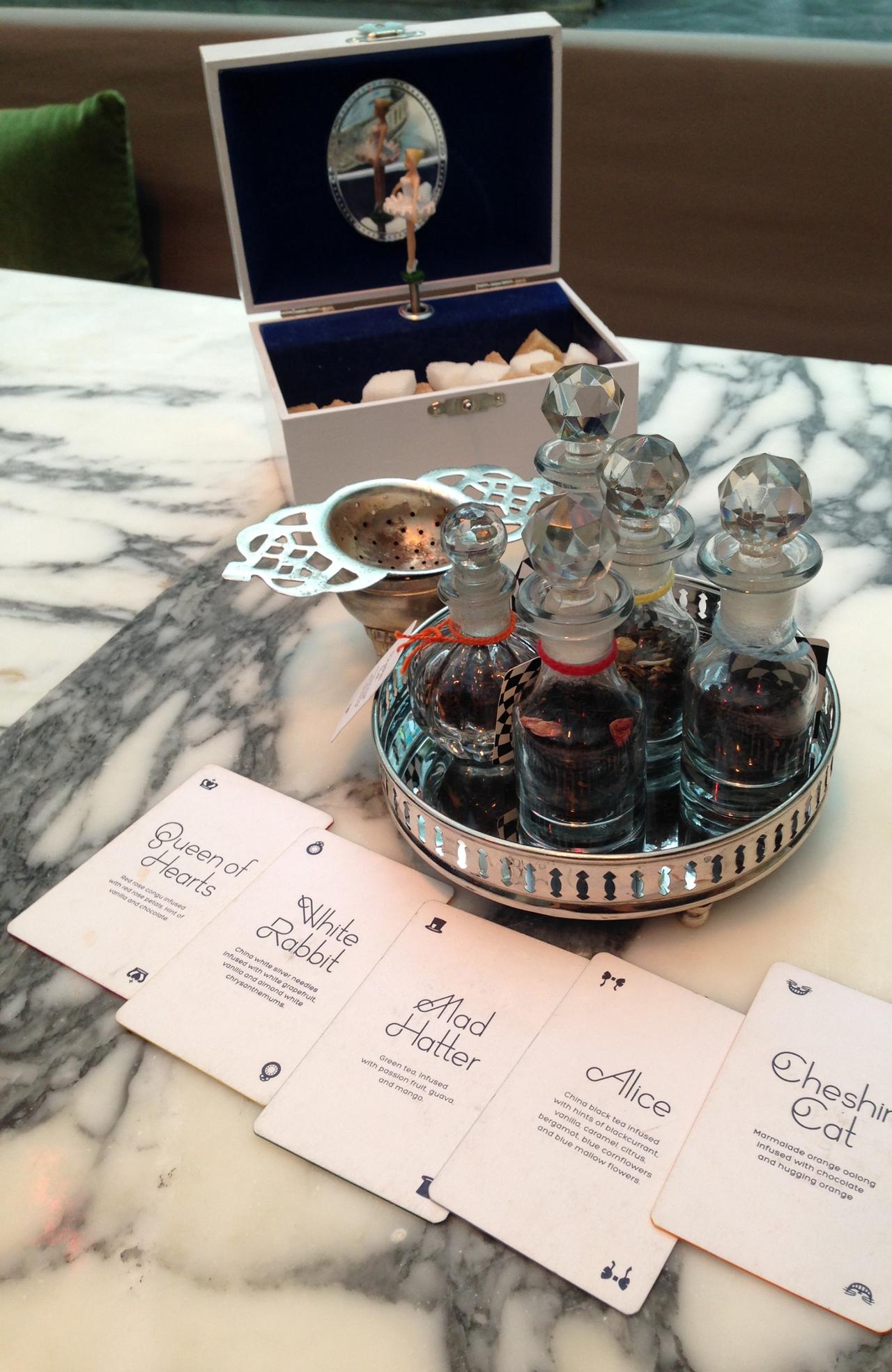 Supplied Travel Escape London Tea Time Twists - Mad Hatter's Tea, themed teas in glass stopper bottles. Image Ama