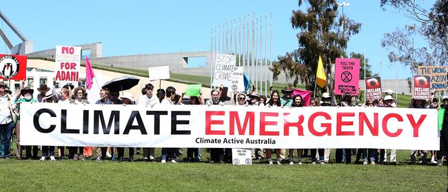 Climate Emergency Rally on the lawns outside at Parliament House in Canberra. Picture Kym Smith