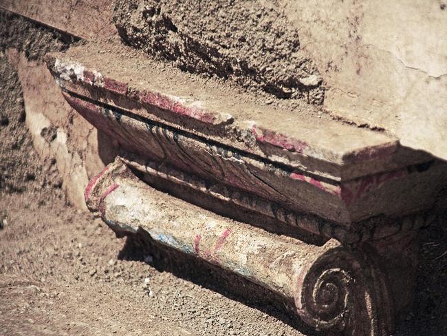 Welcome mat ... A decorative capital covered with the remains of painted plaster is seen at the entrance to the Amphipolis tomb. Source: AP