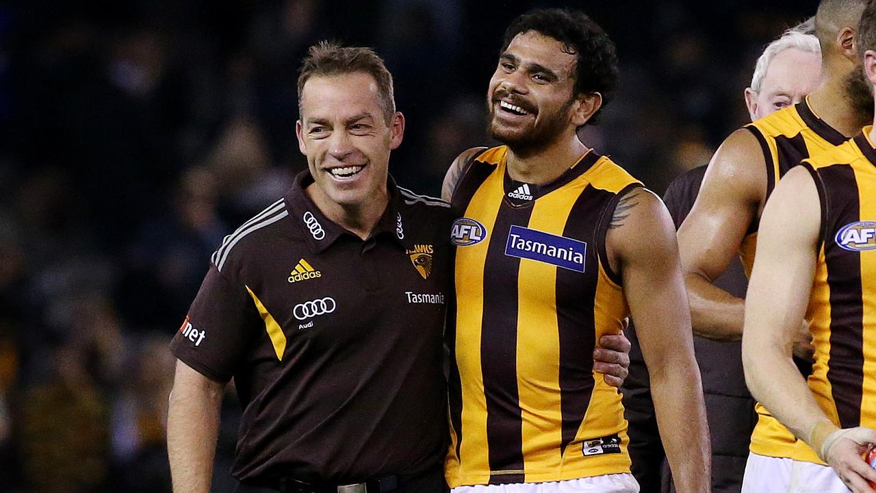 Alastair Clarkson and Cyril Rioli. Picture: Colleen Petch.