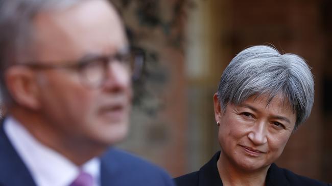 Penny Wong listens to Anthony Albanese speak at a press conference. Picture: Getty Images