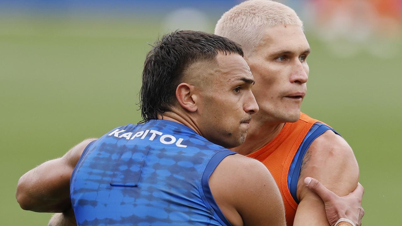 Jamarra Ugle-Hagan and Rory Lobb jostle at training on Thursday. Picture: Michael Klein